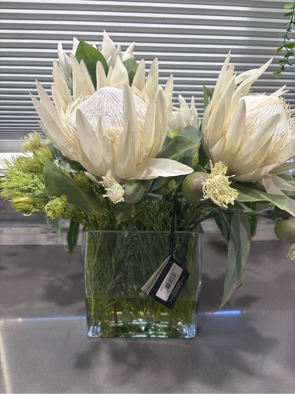 Allstate living Cream Protea Faux Floral Arrangement in Clear Glass Vase